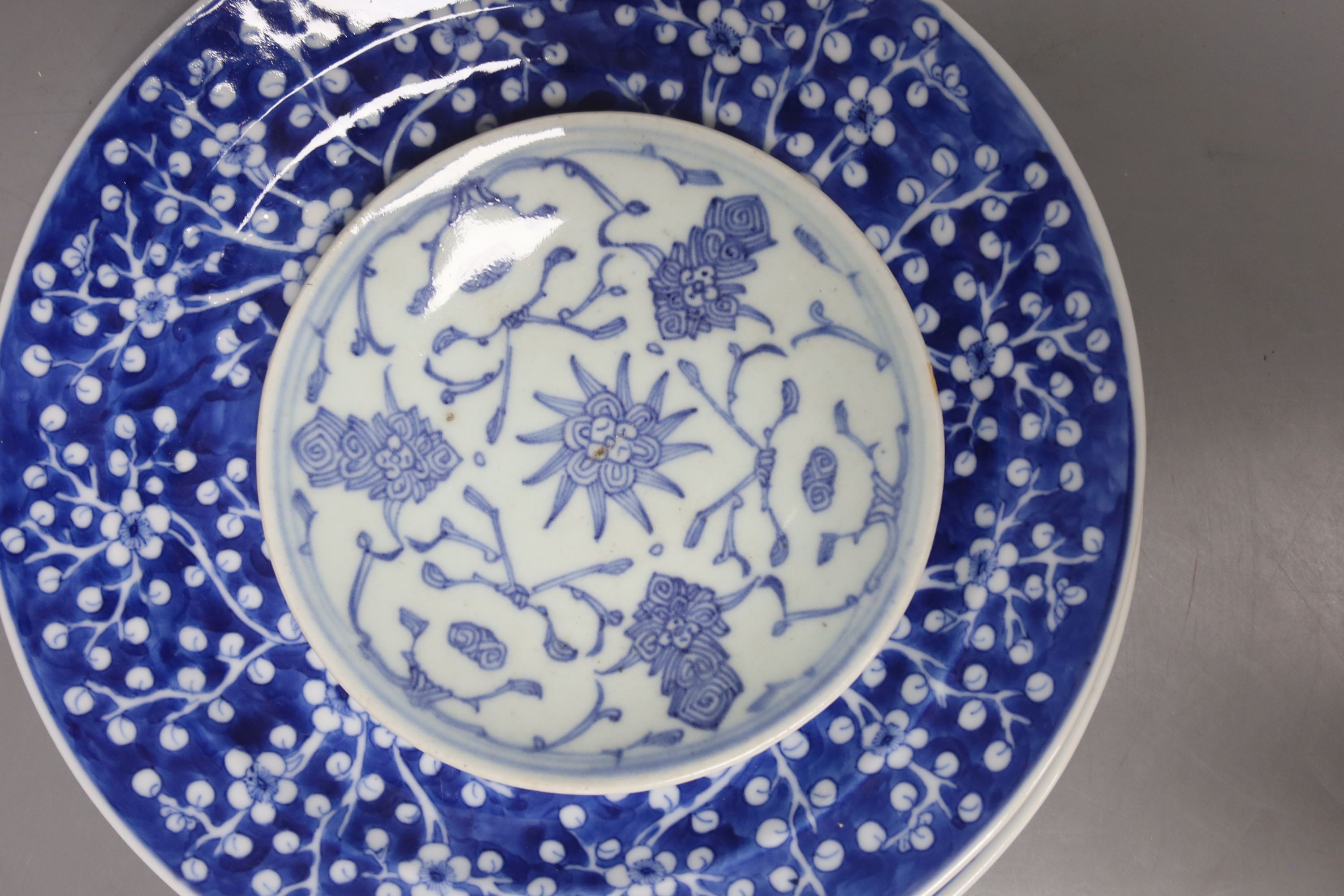 A group of 19th century Chinese blue and white plates, dishes and a cup